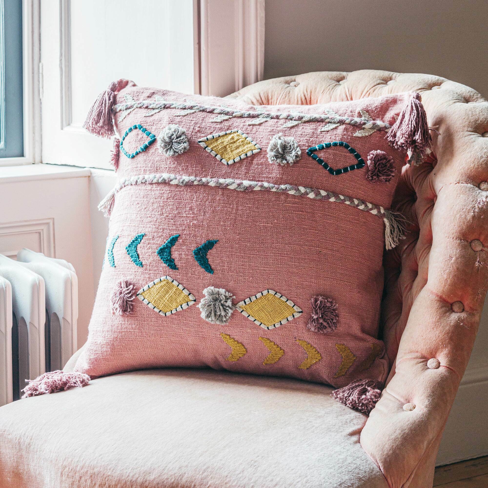 Read more about Graham and green jaz two stripe square cushion with pom poms