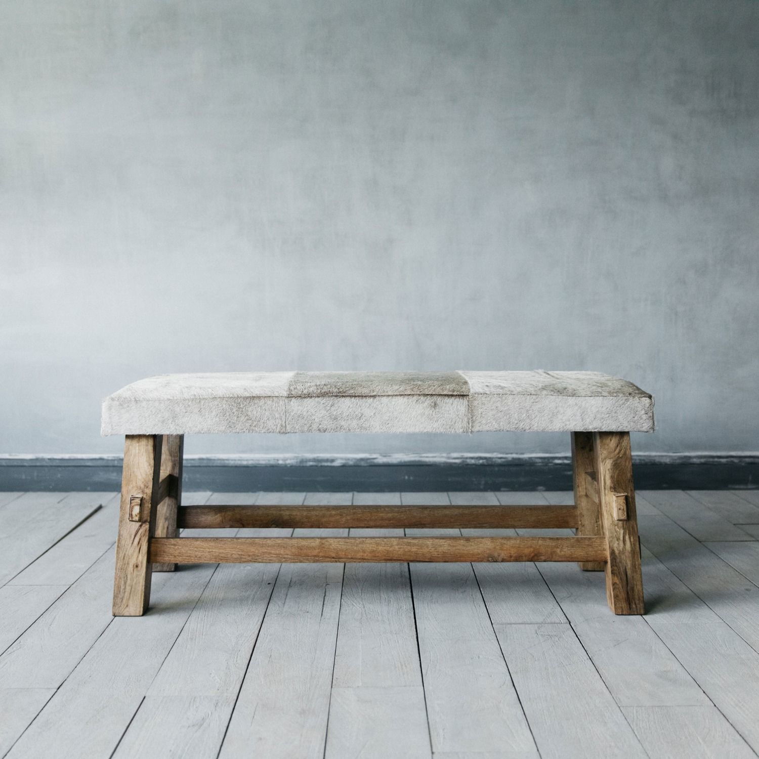 An image of Grey Cowhide Bench