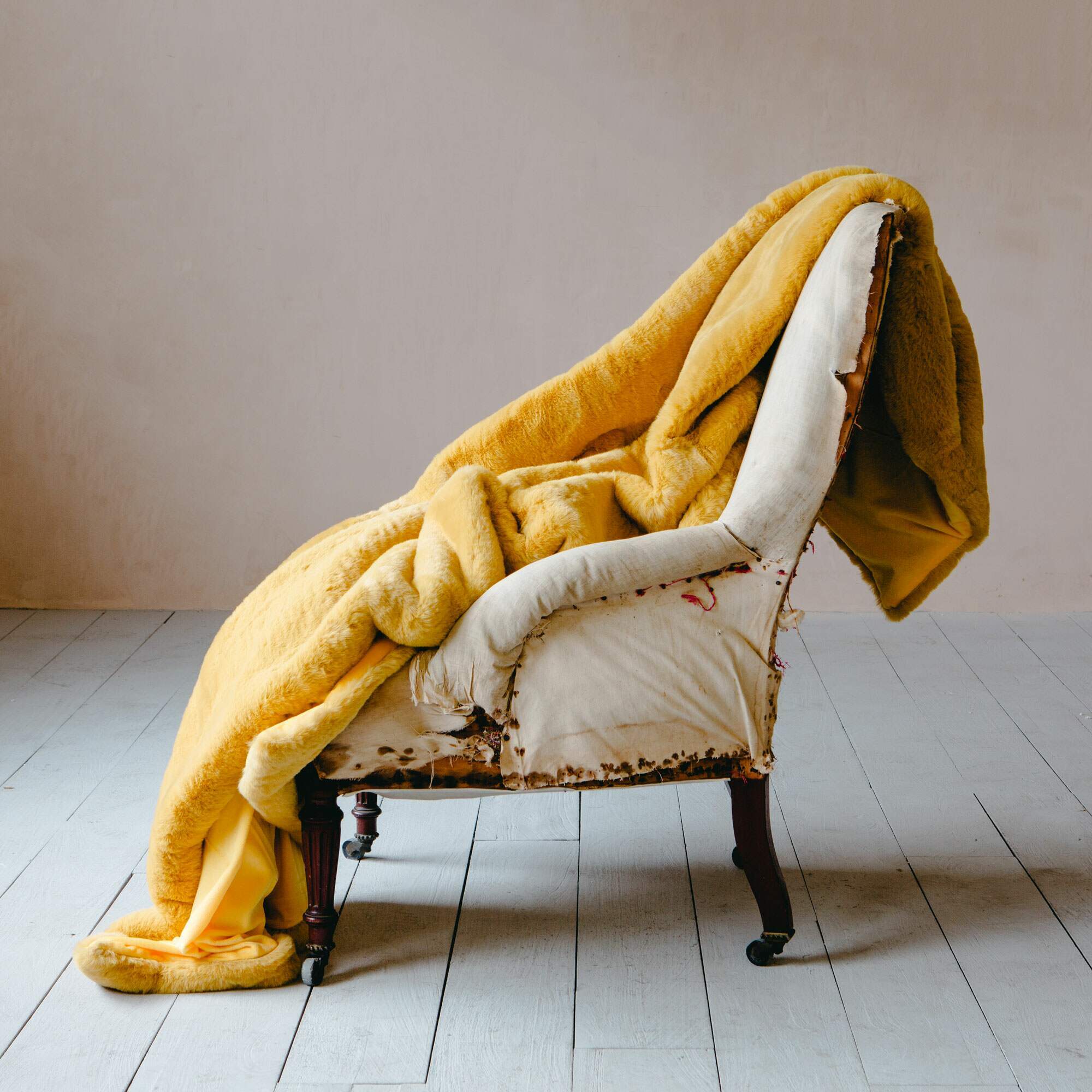 Photo of Graham and green golden yellow faux fur throw