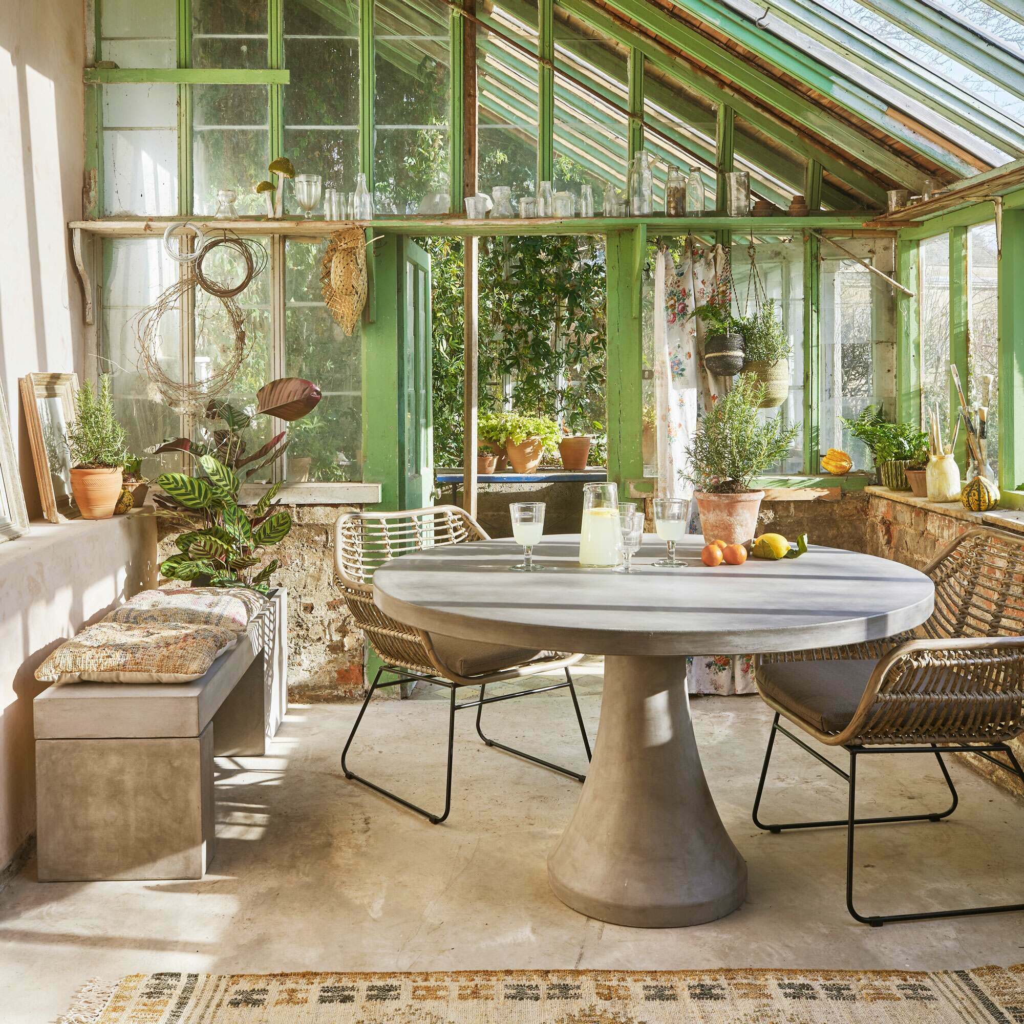 Read more about Graham and green round concrete outdoor table