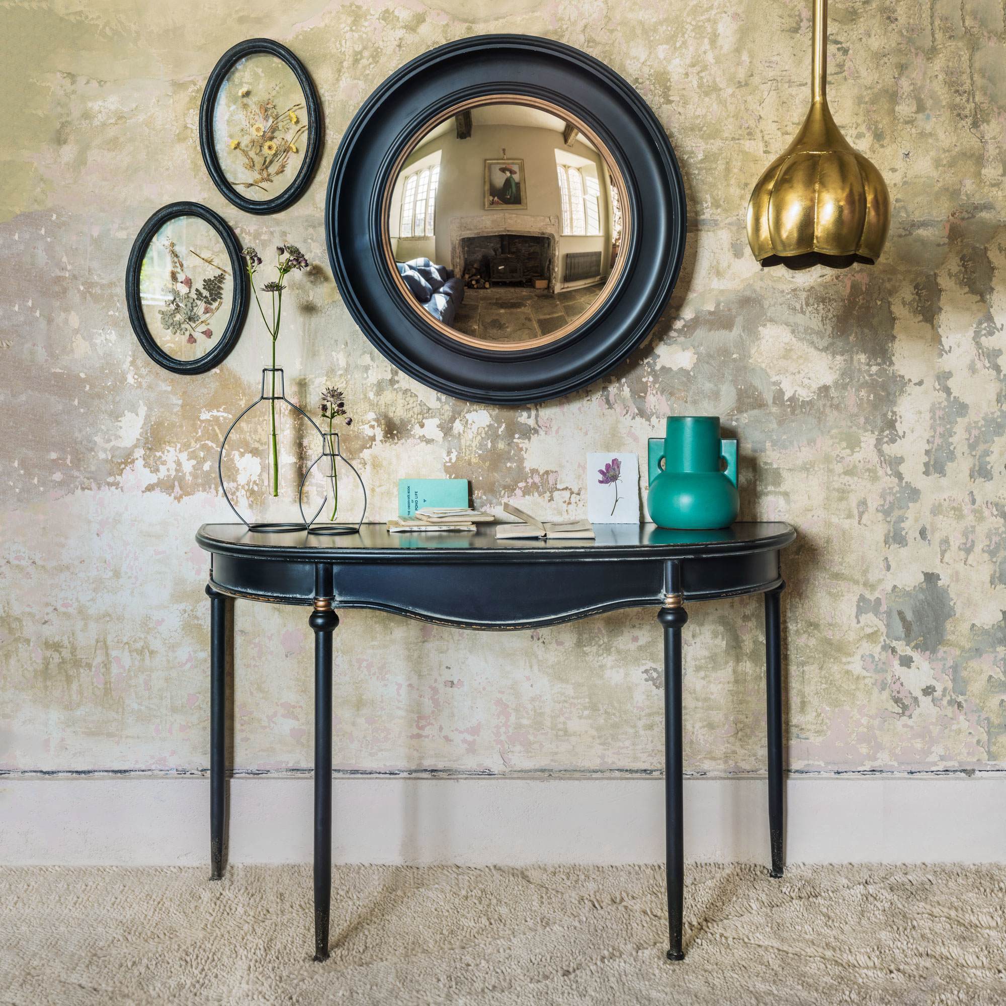 Photo of Graham and green black curve console table