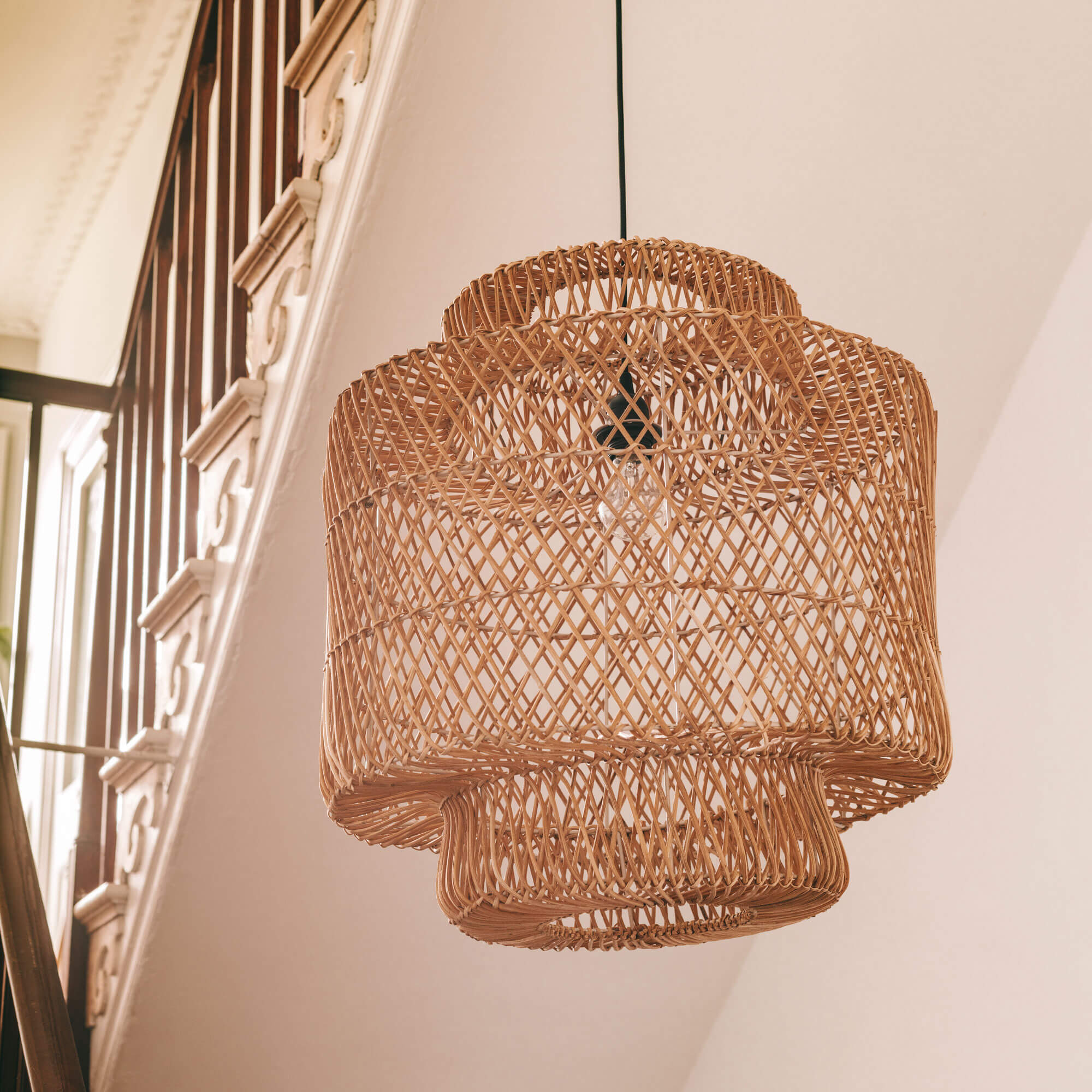 Photo of Graham and green tiered rattan pendant