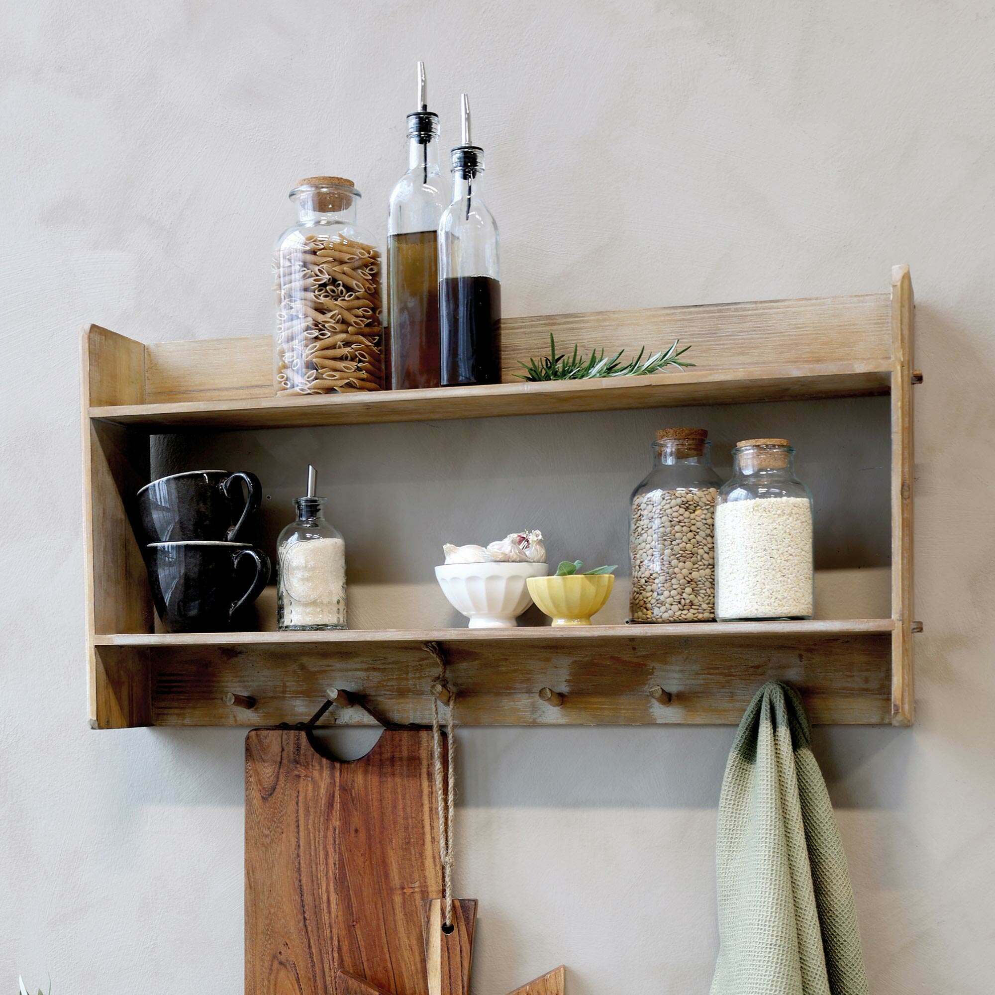 Photo of Graham and green wooden shelf with hooks