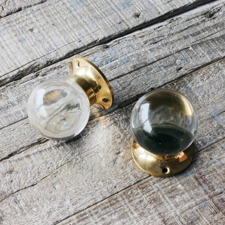 Set of Two Clear Glass and Brass Globe Door Knobs