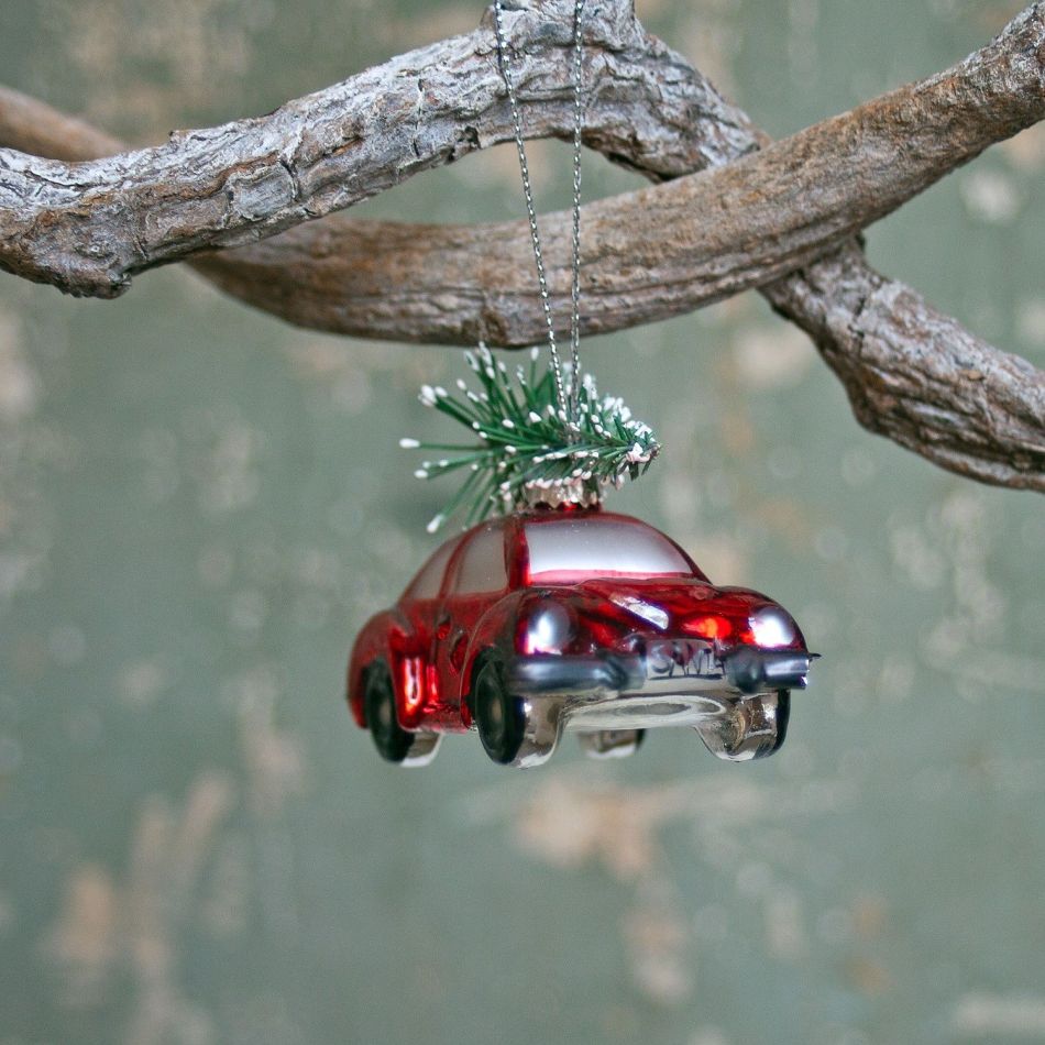 Small Red Vintage Car with Christmas Tree Decoration