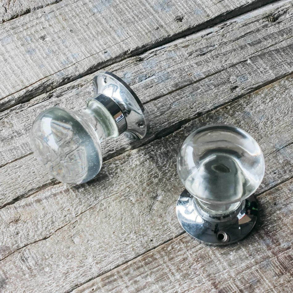 Set of Two Clear Glass and Chrome Flat Globe Door Knobs
