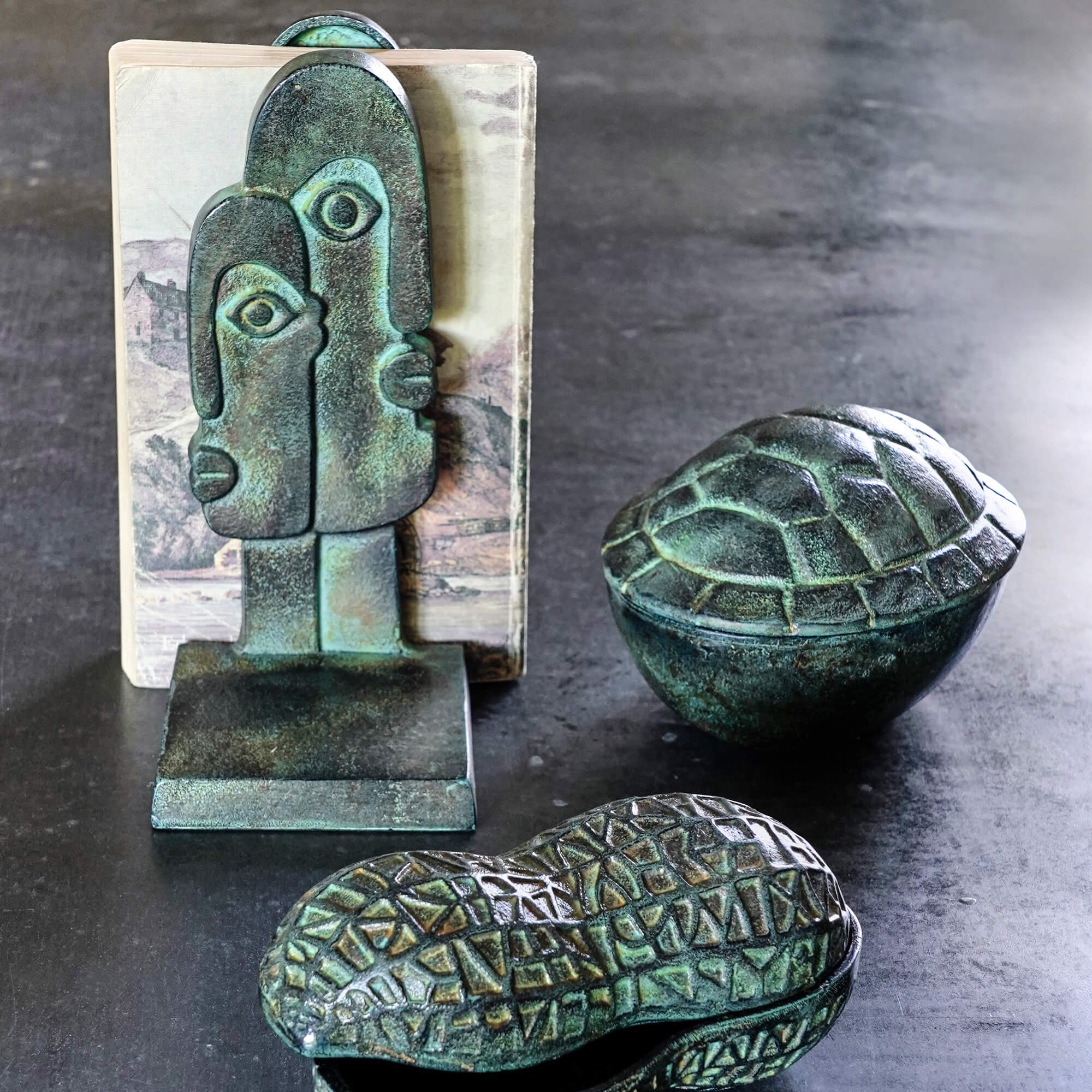 Read more about Graham and green sculptural face bookends