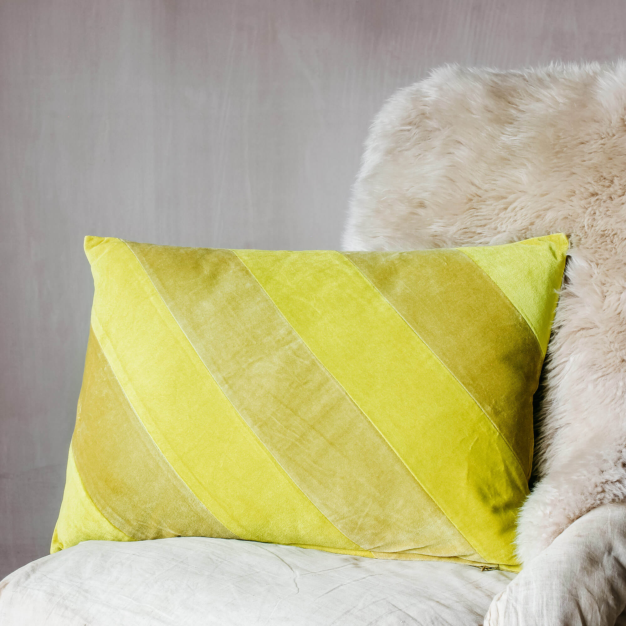 Read more about Graham and green lemon and lime striped velvet cushion