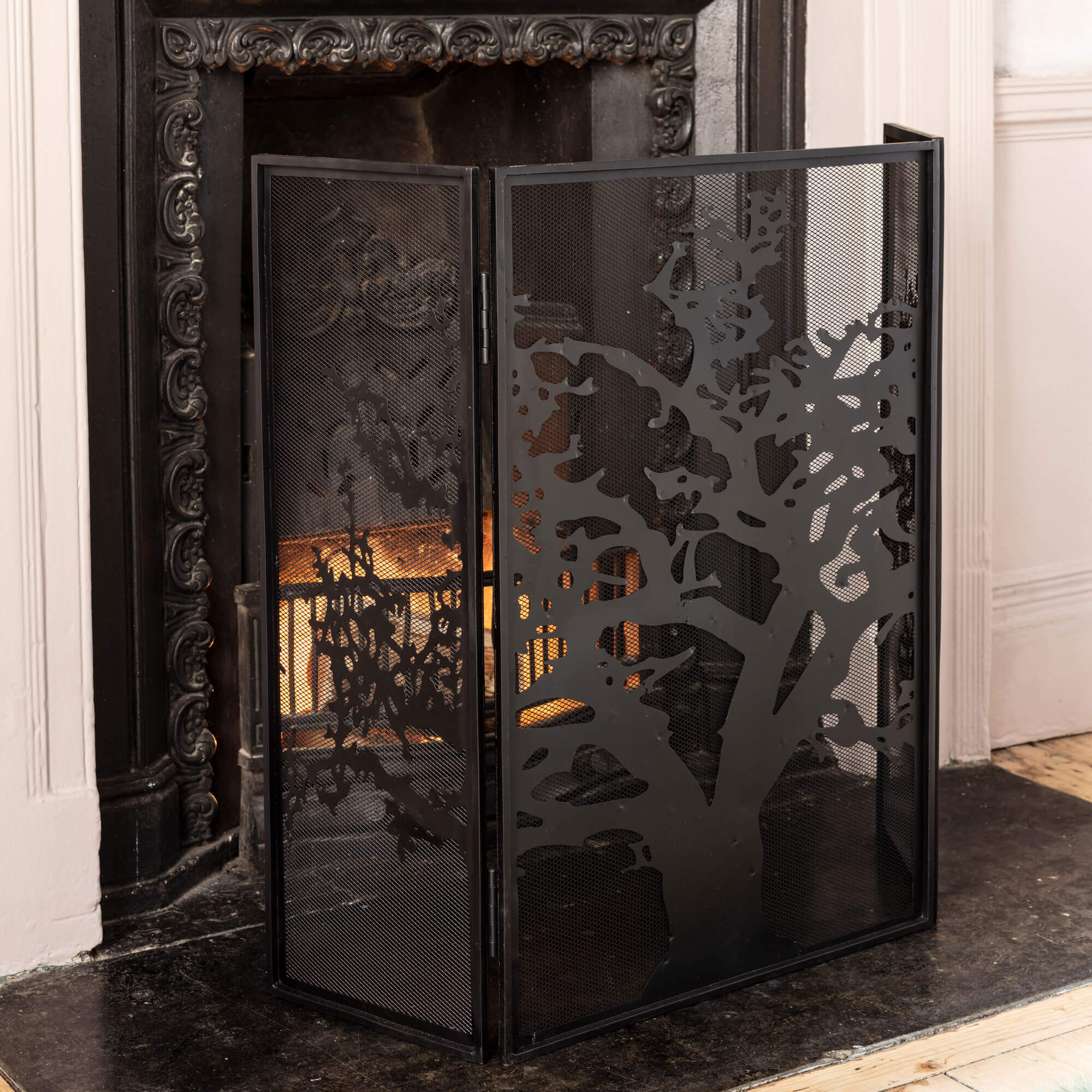 Photo of Graham and green tree of life fire screen