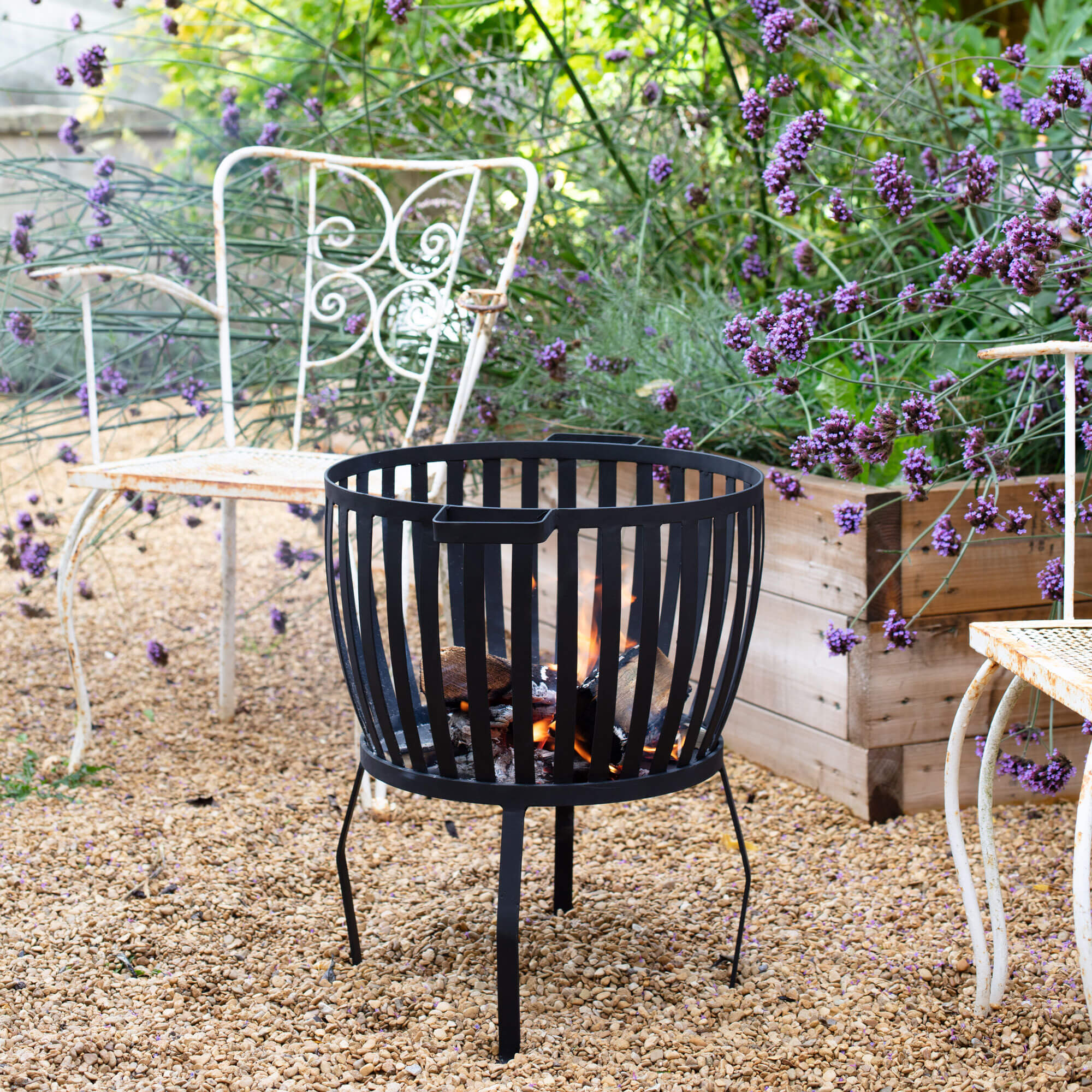 Photo of Graham and green raised cage fire pit