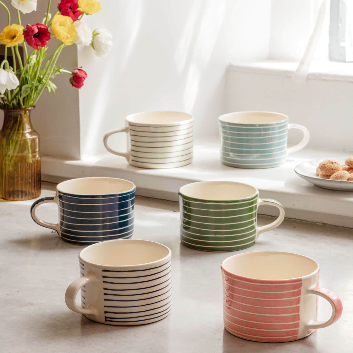 Photo of Graham and green blue and white striped mug