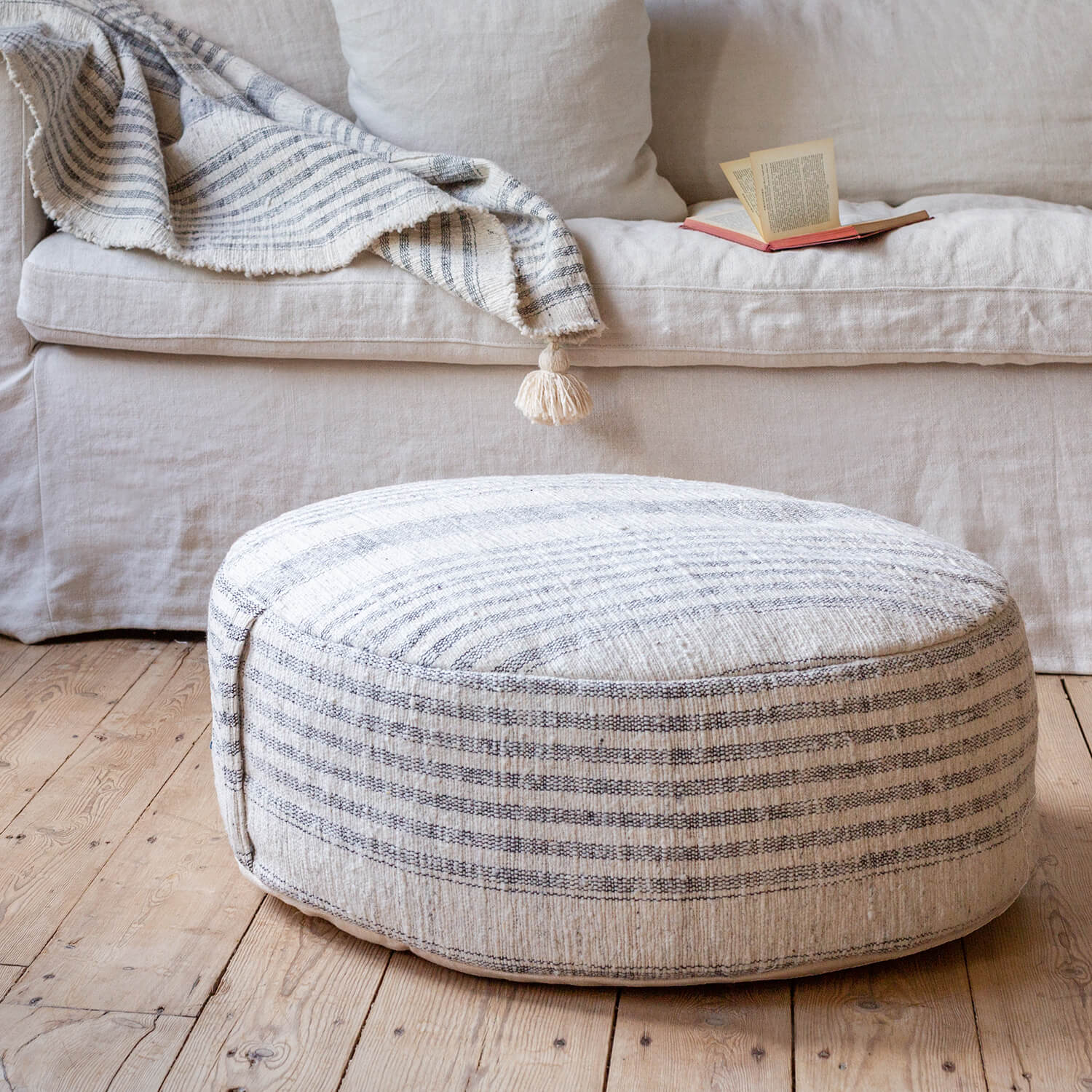 Photo of Graham and green stripe hand-loomed pouffe