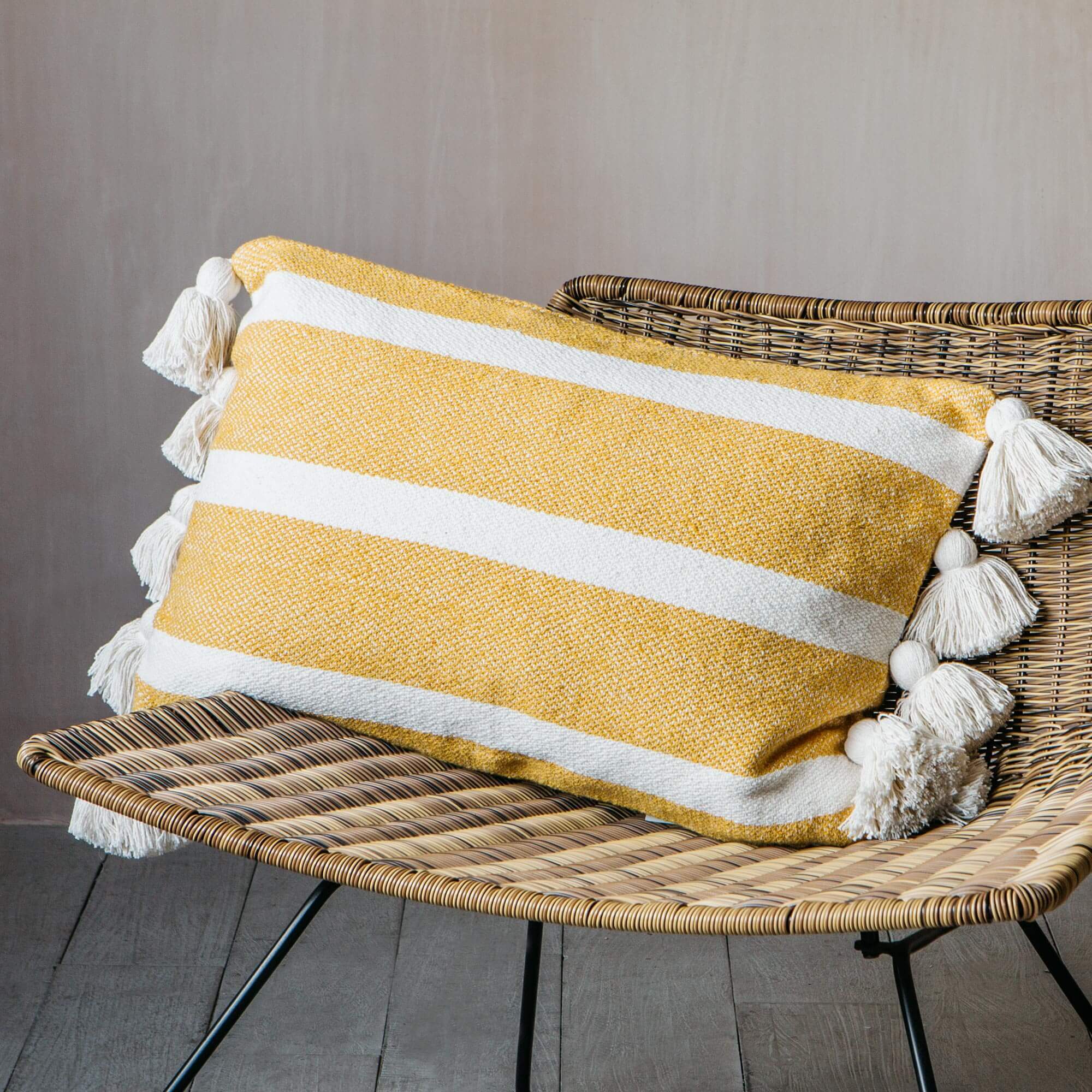 Read more about Graham and green cream and mustard tassel cushion