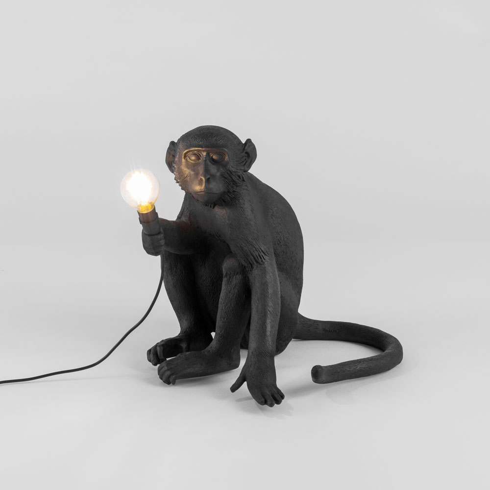 An image of Outdoor Black Sitting Monkey Lamp