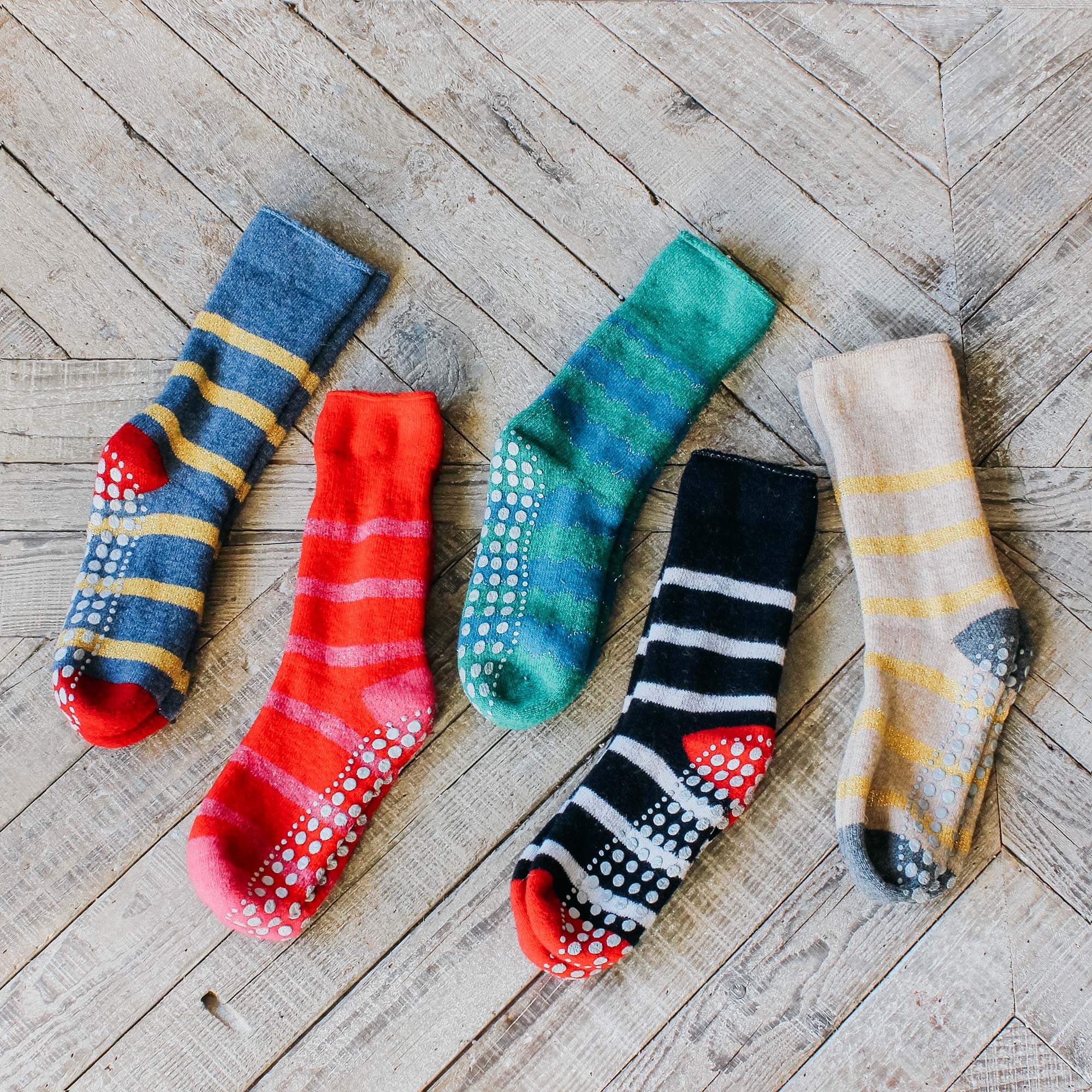 Photo of Graham and green gold and blue striped slipper socks