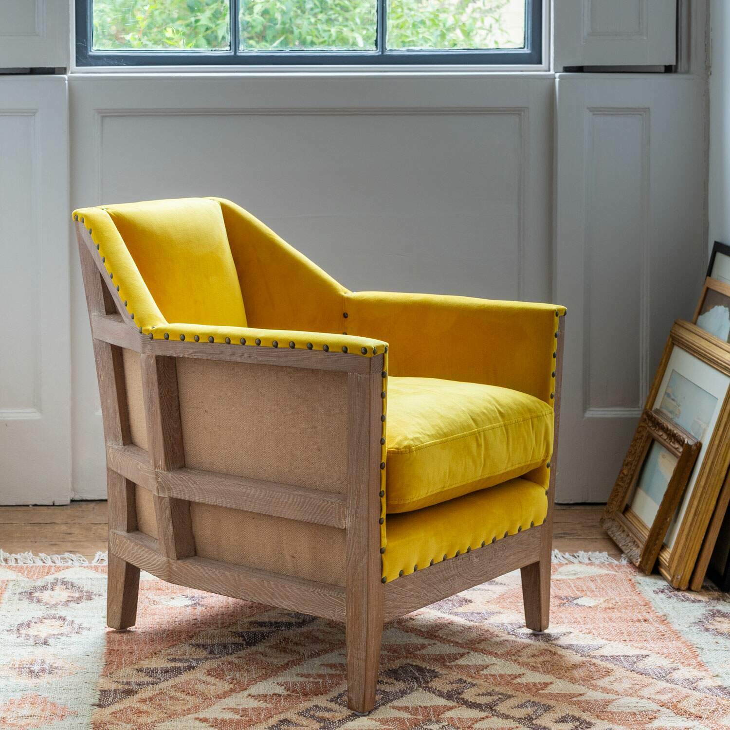 Photo of Graham and green hoxton yellow velvet armchair