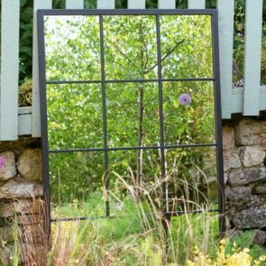 Brighten your exterior space with an outdoor mirror that will shine those summer rays into your garden.